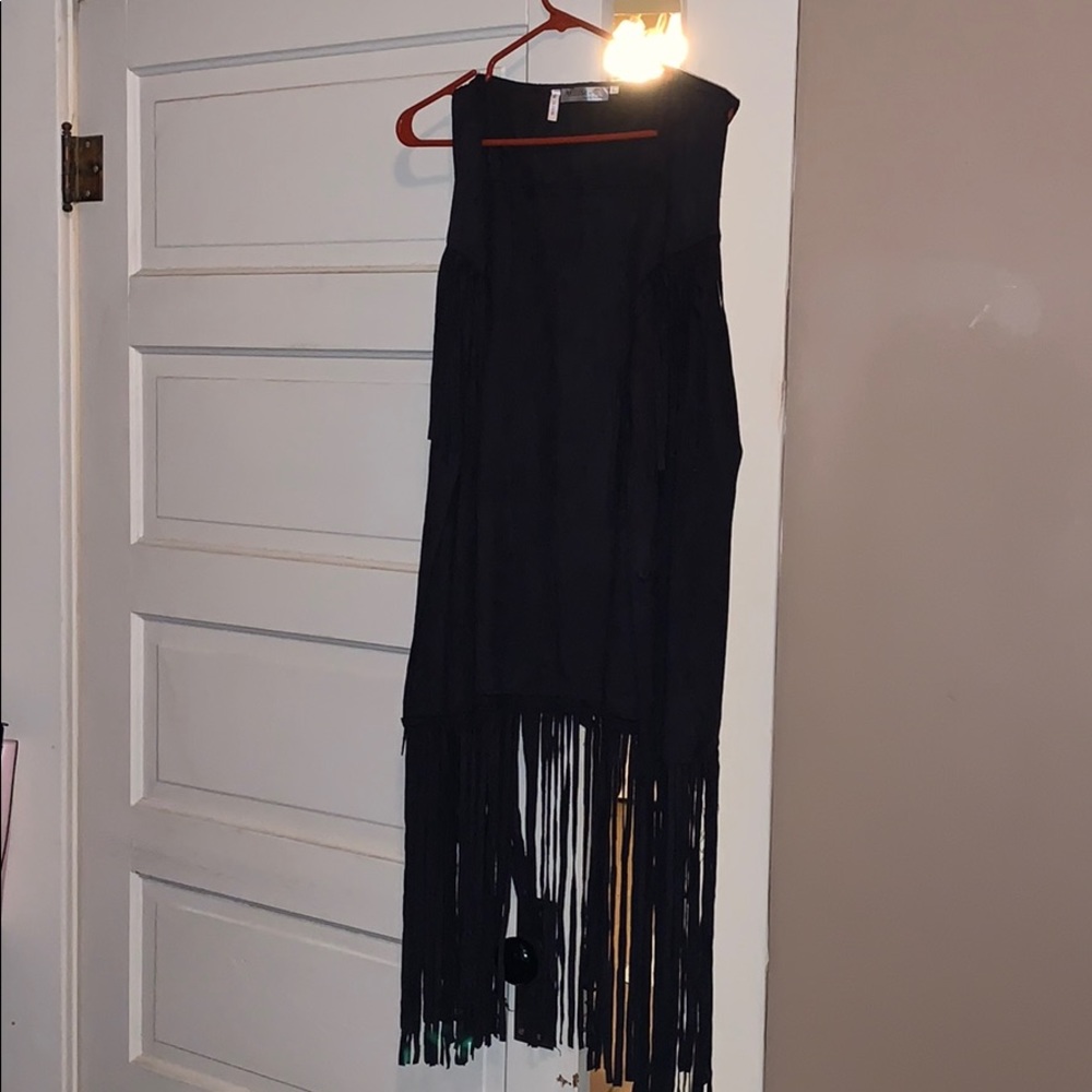 Knee length fringe vest size large